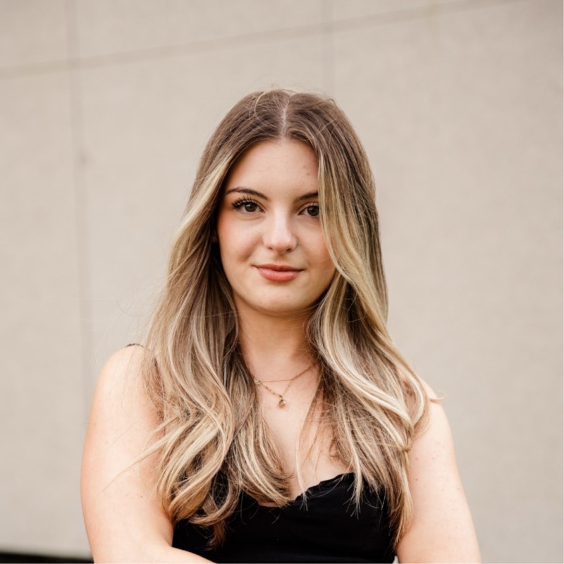 Katrin Kanevsky smiling in a headshot style photo